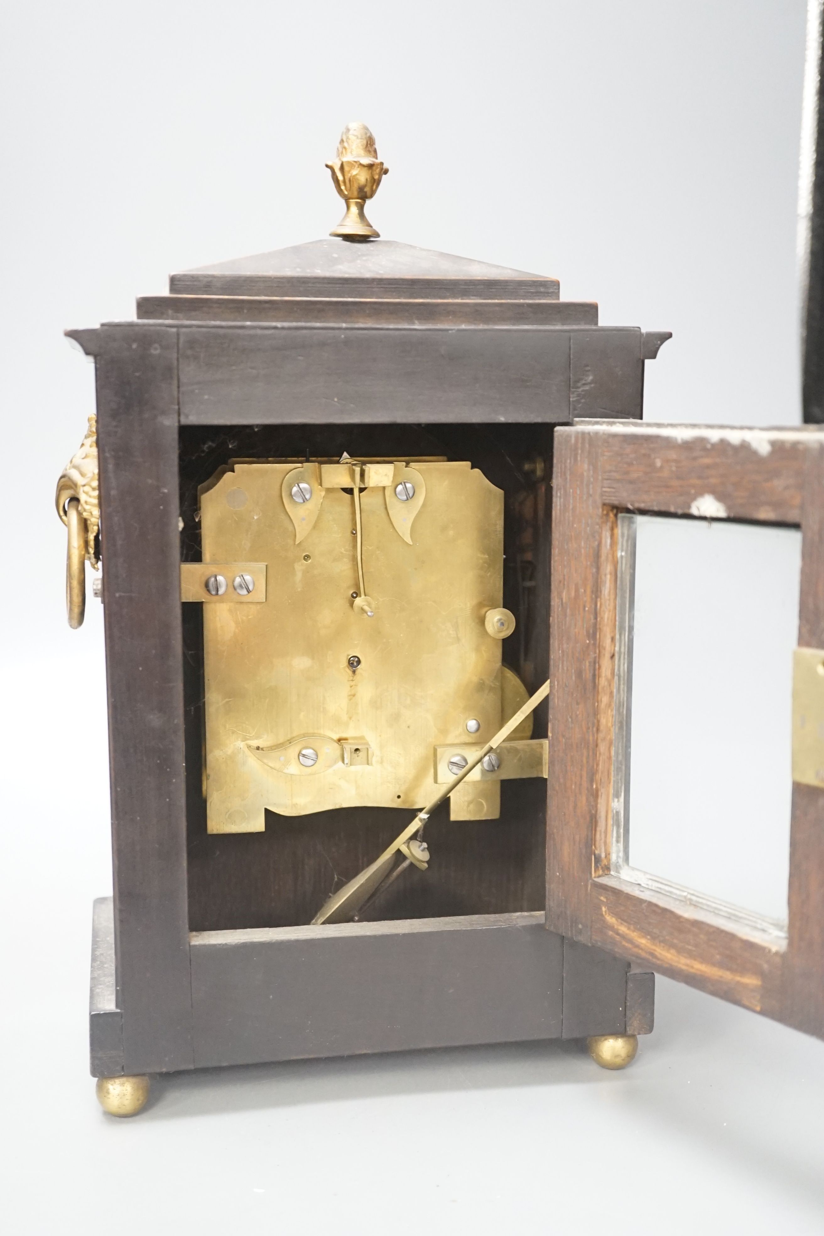 A Regency ebonised and brass inlaid bracket clock, by Rossiter, Bridgwater, 32cm